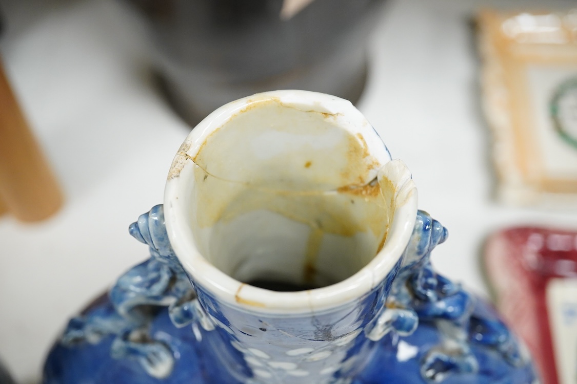 A Chinese blue and white prunus flower moon-flask and a Gu vase, largest 30cm high